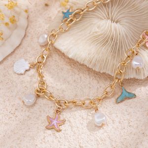 Charm Necklace with Seashell and Pearl Accents