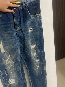 Distressed Blue Jeans