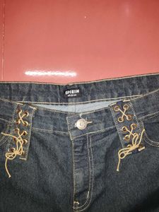 Y2k country inspired flared dark wash jeans
