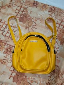Yellow Backpack by ASTIR COLLEEN