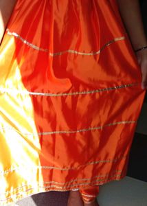 Vibrant Orange Kurta Set with Golden Accents