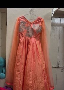 Elegant Coral Gown with Capelet