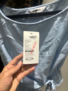 Light Blue Tie-Waist Sleeveless Top