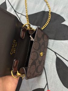 Coach Monogram Mini Bag