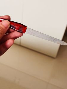 Nail File with Red Handle