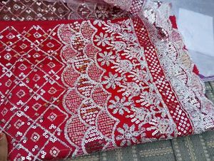 Red dress material with embroidery work
