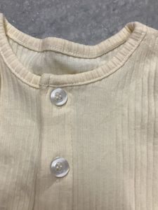 Cream Ribbed Long Sleeve Bodysuit