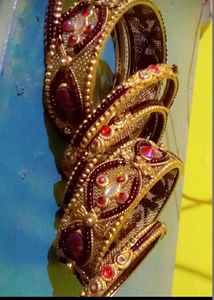 Elegant Gold and Ruby Bangle