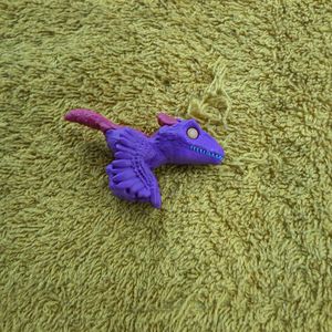 Kinder Joy Jurassic Pyroraptor figure