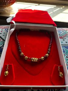 Elegant Beaded Necklace with Embellishments