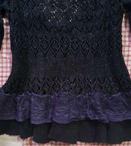 Elegant Black Knitted Top with Ruffle Detail