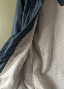 Lightweight polyester windbreaker jacket