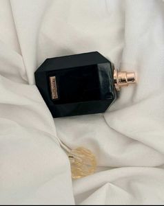 Revolution  Perfume Bottle,HALF USED,FIXED PRICE