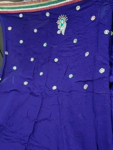 Vibrant Purple Saree with Peacock Embroidery