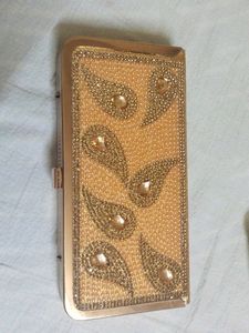 Beautiful Golden Clutch For Party Wear Used Once And Kept As It Is..
