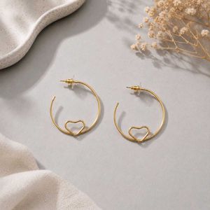 Gold Hoop Earrings with Heart Detail