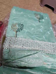 unstitched party wear suit with beautiful design