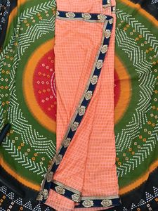 Elegant Peach Saree with Floral Border