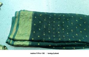 Elegant Dark Green Saree with Golden Accents