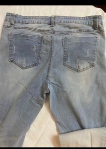 Distressed Light Wash Denim Jeans