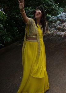 Vibrant Yellow Sequined prestitched Lehenga Choli