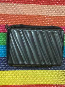 2 TUMI &amp; 1 FERRAGAMO Travel Pouches