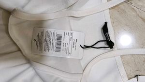 White Peplum Camisole Top
