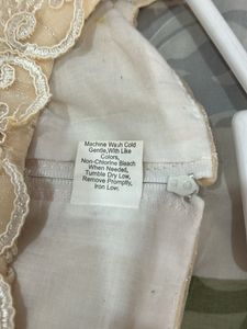 Elegant Cream Ruffled frock