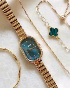 Elegant Green Dial Watch with Bracelets