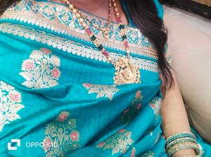 Beautiful Teal Saree with Intricate Weaving