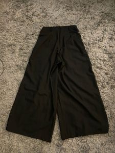 black long flared trousers