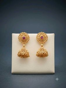 Gold Jhumka Earrings with Ruby Accent