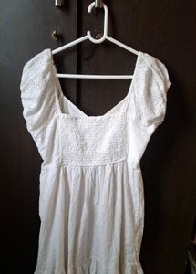 white cotton puff sleeved dress