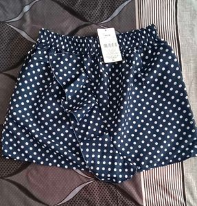 Polka Dot Mini Skirt with Ruffle Detail