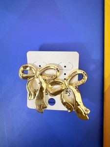 Gold Tone Bow Earrings