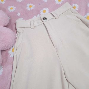 Beige High-Waist Women's trousers.