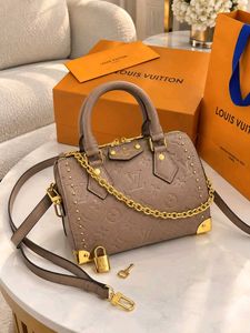 Louis Vuitton Speedy-style studded trunk handbag w