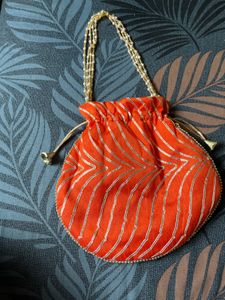 Elegant Orange Potli Bag