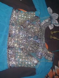 Stunning Blue Anarkali Suit with Intricate Embelli