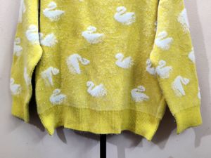 imported women's yellow crewneck sweater
