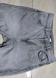 Grey baggy and bootcut jeans