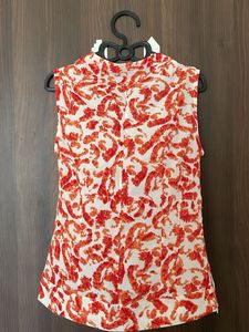 Stylish Orange &amp; White Print Sleeveless Top