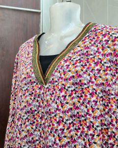 Chic Floral Print Top with Embellished Neckline