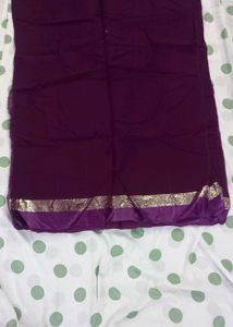 Elegant Purple Saree with Golden Border