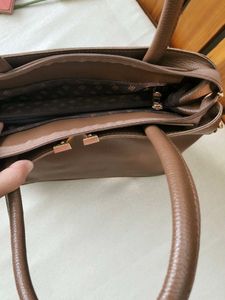 Chic Brown Handbag with V Accent