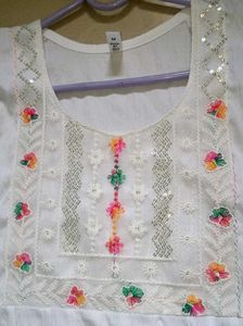 Elegant White Tiered Kurta with Tassels