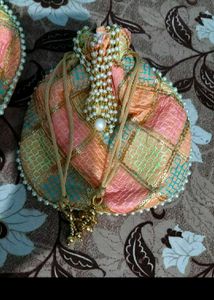 Elegant Red Potli pouch with Pearls