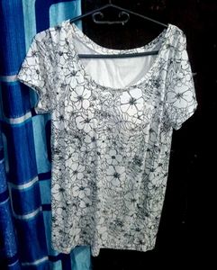 woman black white top
