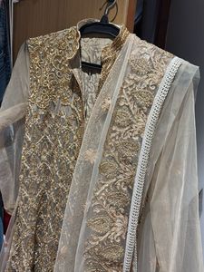 Elegant Embroidered Ethnic Gown with bead stones