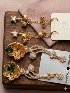 Elegant Gold Earrings with Green Stone